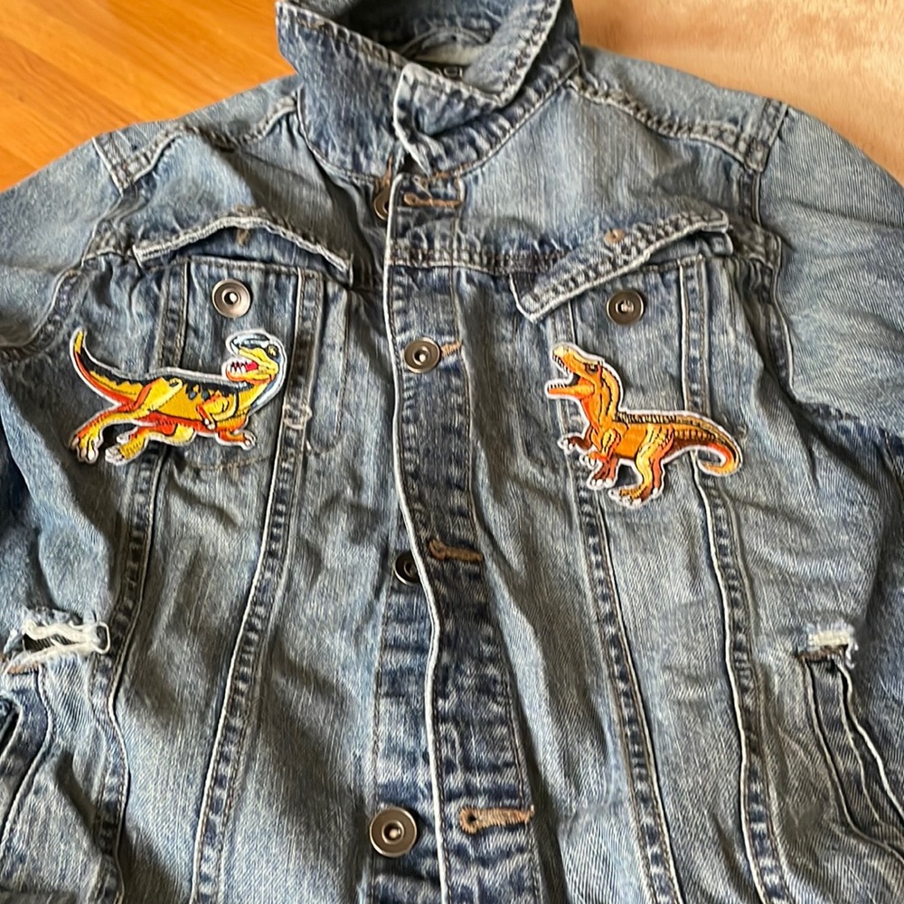 Costumed children place Jean jacket
